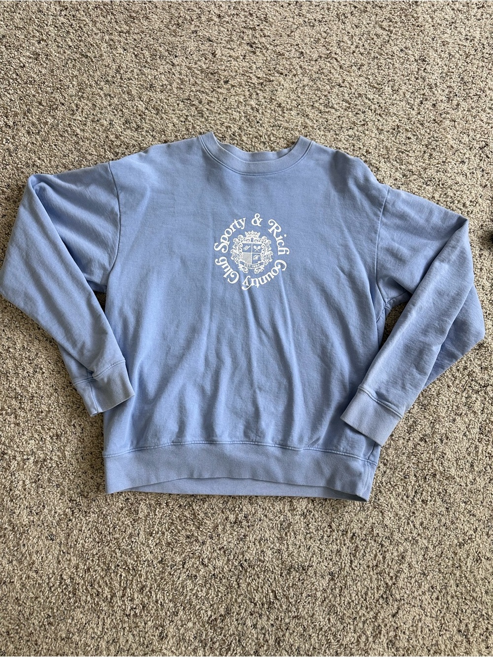 Sporty & Rich Pastel Blue Crewneck Sweatshirt with Crest Logo